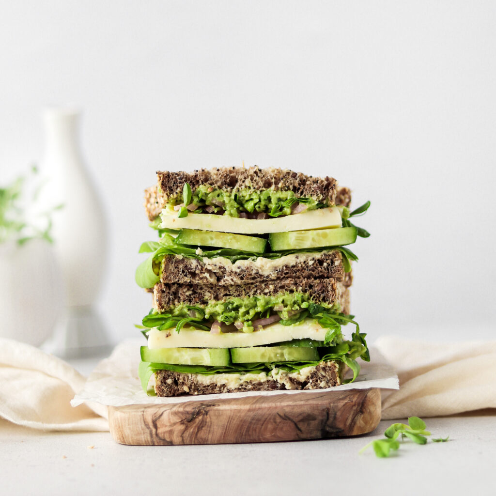 Green goddess sandwich on chopping board