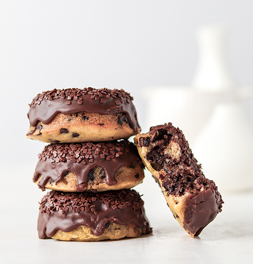 Choc chip donuts stacked on top of each other 