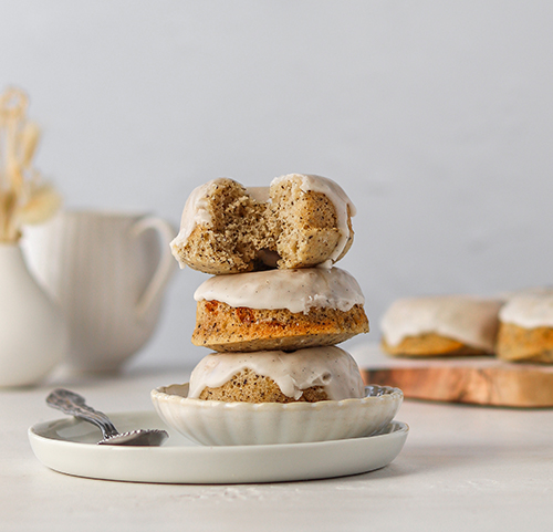 Stack of baked donuts on small plates