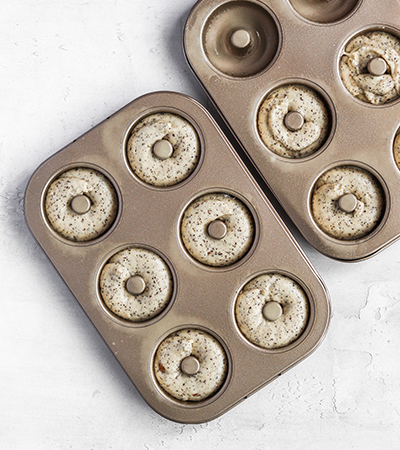 Donuts in pan before baking