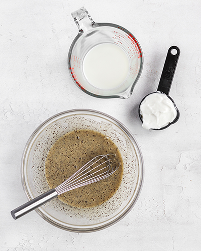 Donut batter's wet ingredients in bowls