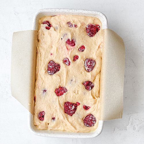 raspberry lemon pound cake, un-baked and in the cake tin