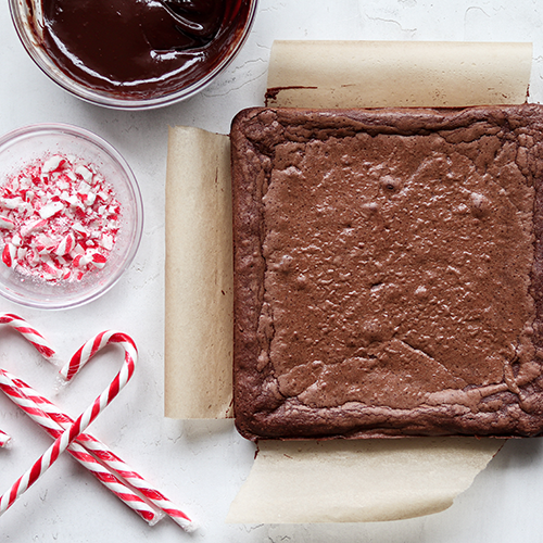 Chocolate ganache ready to top the brownies