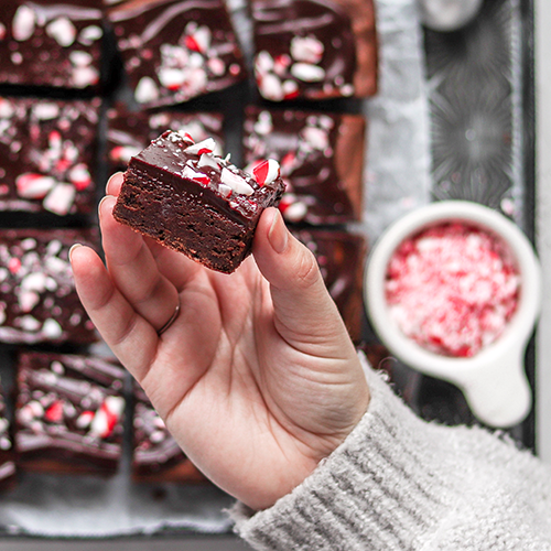 Cosmic Christmas Brownie in hand